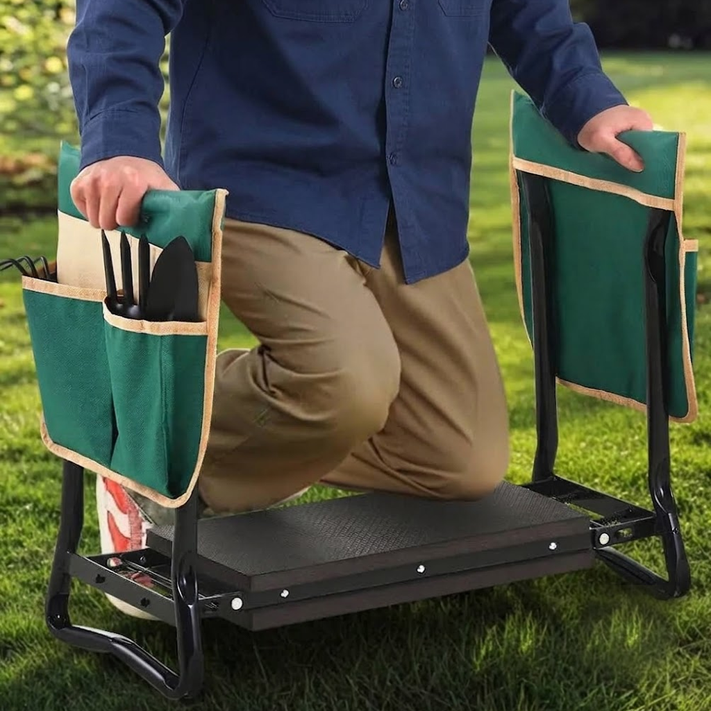 Person kneeling on the garden kneeler and holding the side rails